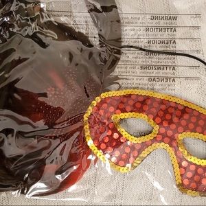 Mardi Gras mask masquerade mask. Red and gold